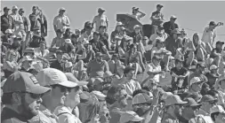  ?? PATRICK BREEN/THE REPUBLIC ?? Fans watch Sahith Theegala putt on the ninth hole during Round 3 of the 2022 WM Phoenix Open.