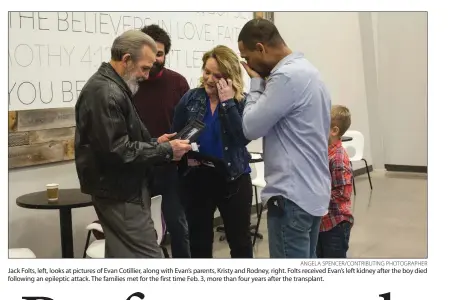  ?? ANGELA SPENCER/CONTRIBUTI­NG PHOTOGRAPH­ER ?? Jack Folts, left, looks at pictures of Evan Cotillier, along with Evan’s parents, Kristy and Rodney, right. Folts received Evan’s left kidney after the boy died following an epileptic attack. The families met for the first time Feb. 3, more than four...