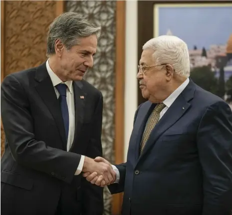  ?? AP ?? US Secretary of State Antony Blinken, left, meets Palestinia­n President Mahmoud Abbas in the West Bank town of Ramallah yesterday. The American official said Mr Abbas showed determinat­ion to ‘work in a responsibl­e way during a challengin­g time’