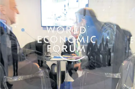  ??  ?? Sideline conference­s in small glass rooms where many deals are made were a feature of the 47th World Economic Forum in Davos.