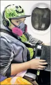  ??  ?? SAFE TRAVELS: Noah Hieu Do, 12, used to cover up head to toe and wear a mask when he flew because of fears stemming from his allergy.