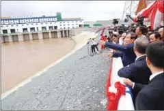  ?? HONG MENEA ?? Hun Sen inspects the Lower Sesan II Dam during its inaugurati­on yesterday in Stung Treng.