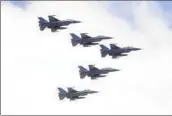  ?? Chiang Ying-ying Associated Press ?? THE U.S. approved a new round of sales of munitions for F-16 fighter jets, shown flying in Taipei, Taiwan.