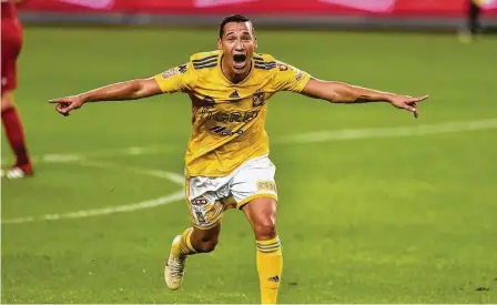  ?? Frank Gunn / The Canadian Press vía AP ?? Jesús Dueñas, de Tigres de México, festeja tras anotar uno de los dos goles que marcó ante el Toronto FC, de la MLS, durante el partido por la Campeones Cup, disputado el miércoles 19 de septiembre de 2018.