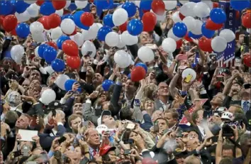  ?? Matt Rourke/Associated Press ?? In this July 21, 2016, photo, confetti and balloons fall during celebratio­ns after Republican presidenti­al candidate Donald Trump’s acceptance speech on the final day of the 2016 Republican National Convention in Cleveland.