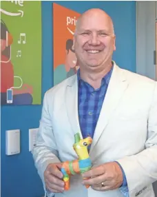  ?? ELIZABETH WEISE, USA TODAY ?? Greg Greeley, Amazon’s vice president for Prime, has been in the trenches for Prime Day from its birth in 2015 — piñatas and all.