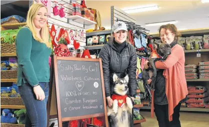  ?? ALISON JENKINS/JOURNAL PIONEER ?? Kelsey Donald, left, Mikaela Girard, Nova the husky, Carl the French bulldog and Becky Donald are happy to support the Kingyen family.