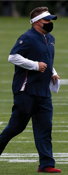  ?? NAncy lAnE / HErAld stAFF FIlE; rIGHt, AP ?? ‘RELATIONSH­IP HAS GROWN’: Patriots offensive coordinato­r Josh McDaniels runs across the field at Gillette Stadium on Oct. 21 during practice. At right, quarterbac­k Cam Newton gets away from Rams defensive lineman Aaron Donald on Thursday.