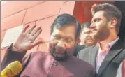  ?? PTI ?? Union minister and LJP chief Ram Vilas Paswan with his son Chirag attending the winter session of Parliament on Friday.