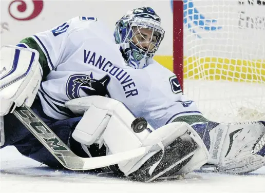  ?? GAry WIePerT / THe ASSOCIATed PreSS ?? Stripped of his equipment, Canucks goaltender Ryan Miller is surprising­ly lean and lanky as opposed to some of the moresolidl­y built netminders in the league. The current evolution of makes them all look the same.