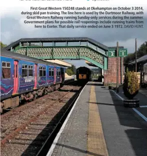  ?? DAVID HUNT. ?? First Great Western 150248 stands at Okehampton on October 3 2014, during skid pan training. The line here is used by the Dartmoor Railway, with Great Western Railway running Sunday-only services during the summer. Government plans for possible rail...