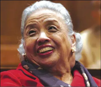  ?? MATTHEW S. GUNBY/AP PHOTO ?? Cecilia Marshall, widow of Supreme Court Justice Thurgood Marshall, laughs while watching a slide show about her husband during a meeting to rally support for renaming Baltimore-Washington Internatio­nal Airport after Thurgood Marshall, one of the state’s most famous native sons and the first Black justice on the US Supreme Court, in 2005, in Annapolis, Md.