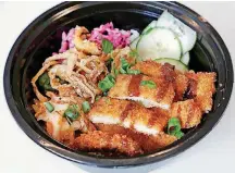  ?? BY JIM BECKEL, THE OKLAHOMAN] ?? This is the fried chicken bowl at Ur/Bun in Oklahoma City’s Uptown district.[PHOTO