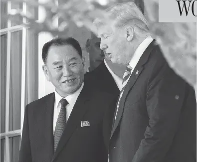  ?? ANDREW HARNIK / THE ASSOCIATED PRESS ?? President Donald Trump talks with Kim Yong Chol, former North Korean military intelligen­ce chief and one of leader Kim Jong Un’s closest aides, as they walk from their meeting in the Oval Office of the White House on Friday.