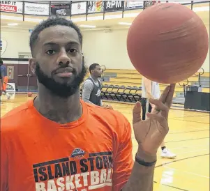  ?? CHARLES REID/THE GUARDIAN ?? Torrence Dyck Jr. has a little fun while warming up for a recent Island Storm practice. Dyck and crew host the Windsor Express tonight.