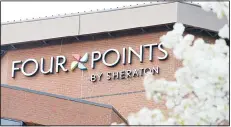  ??  ?? This file photo shows the sign at the Four Points Sheraton Hotel in Richmond, Va. Anbang said, it is dropping its $15 billion offer to acquire Starwood Hotels, citing various market considerat­ions and ending a bidding war for the parent ofSt Regis and Sheraton resorts.