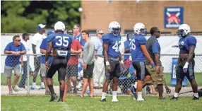  ??  ?? Memphis football players move down the field in between drills during a practice in Jackson on Saturday. HENRY TAYLOR/USA TODAY NETWORK-TENNESSEE