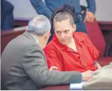  ?? EDDIE MOORE/JOURNAL ?? Tracy Ann Pena sits with her attorney, Michael Rosenfeld, during a court hearing in February. She was indicted this week on 12 counts in the death of her son, Jeremiah Valencia, 13.