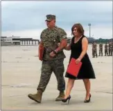  ?? SUBMITTED PHOTO ?? Retiring U.S. Marine Corps Sergeant Major Barry L. Frain Jr. USMC, Blandon, with his wife Stacey, during the retirement ceremony hosted by the Commanding Officer of Marine Aviation Logistics Squadron 49 at Stwart Air National Guard Base, Newburgh,...