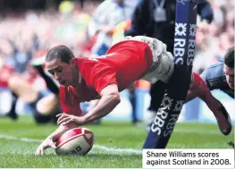  ??  ?? Shane Williams scores against Scotland in 2008.