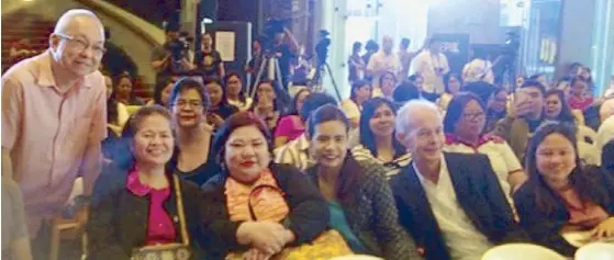  ??  ?? The esteemed screenwrit­er and playwright (leftmost) with the UST team of professors at the opening ceremonies of the 9th Philippine Internatio­nal Literary Festival at the CCP