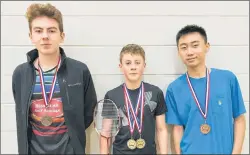  ?? SUBMITTED PHOTO ?? Dylan Batchilder, centre, won the under-19 boys’ singles title at a Badminton P.E.I. under-15 and under-19 tournament in West Royalty recently. Michael Bernard, left, was second while Yihan Zhang won the consolatio­n title.