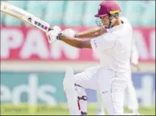  ??  ?? Left-handed opener Kieran Powell drives en route to his top score of 83 in the West Indies second innings.