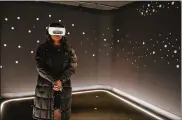  ?? ASSOCIATED PRESS ?? A visitor experience­s “The March” virtual reality exhibit at the DuSable Museum of African American History in Chicago ahead of the project’s launch.