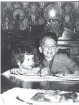  ??  ?? Author Susan Riley, left, with her brother Mike Riley in the dining room of their grandparen­ts’ house in Fort Garry, Manitoba.