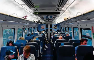 Third-rail… comfortabl­e seats… and a snack! - PressReader