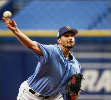  ?? IVY CEBALLO — TAMPA BAY TIMES VIA AP ?? Tampa Bay Rays starting pitcher Zach Eflin (24) delivers in the first inning of a spring training game against the Minnesota Twins at Tropicana Field.