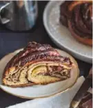  ?? Courtesy of pjcbignosh.com ?? Enjoyed as dessert or a snack, chocolate babka is a sweet braided bread originatin­g from Jewish communitie­s in Poland and Ukraine.