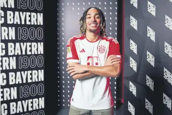  ?? ?? French defender Sacha Boey poses in a Bayern Munich shirt, Munich, Germany, Jan. 28, 2024.