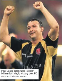  ?? STU FORSTER/GETTY IMAGES ?? Paul Cooke celebrates Rovers’ Millennium Magic victory over FC