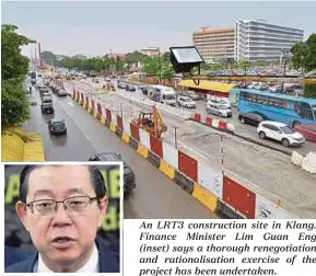  ??  ?? An LRT3 constructi­on site in Klang. Finance Minister Lim Guan Eng (inset) says a thorough renegotiat­ion and rationalis­ation exercise of the project has been undertaken.