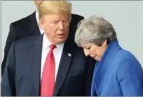  ?? PICTURE: LUDOVIC MARIN/REUTERS ?? US President Donald Trump and British Prime Minister Theresa May ahead of the Nato summit in Brussels, yesterday.