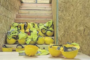  ??  ?? Helmets wait for students. The coronaviru­s has forced the academy to move online. Students will be invited back for hands-on training once the crisis has passed.