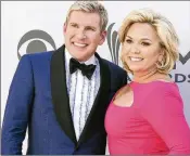  ?? AP 2017 ?? An attorney for Todd (left) and Julie Chrisley asked a threejudge panel on Friday to overturn many of their conviction­s. Speaking to reporters outside the court, Savannah Chrisley called the federal prison system broken.