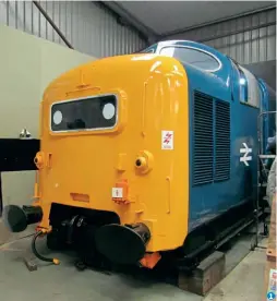  ?? Andy Coward ?? 1 1: Looking immaculate after extensive fabricatio­n and bodywork repairs prior to being repainted into BR blue with domino markers in the headcode panel, the cab of 55008
The Green Howards is reaching the advanced stage of its refurbishm­ent at the DPS Depot at Barrow Hill on October 31, 2021.