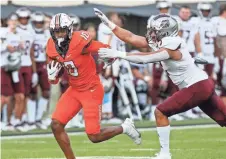  ?? NATE BILLINGS/FOR THE OKLAHOMAN ?? Oklahoma State’s Rashod Owens (10) runs after a catch against Missouri State earlier this season.