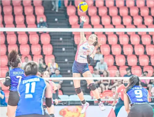  ?? PHOTOGRAPH COURTESY OF PVL ?? BERNADETH Pons of Creamline attacks a hapless Strong Group Athletics defense during their PVL All-Filipino Conference game yesterday at the Philsports Arena. The Cool Smashers prevailed, 25-13, 25-13, 25-19.