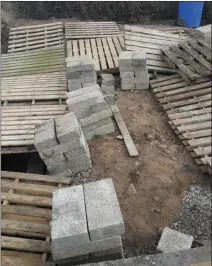  ??  ?? Blocks and pallets at Ballyhack graveyard, where the works took place.