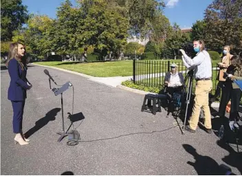  ?? EVAN VUCCI AP ?? House Speaker Nancy Pelosi said comments Thursday by White House communicat­ions director Alyssa Farah (left) about a relief package seemed to contradict guidance by Treasury Secretary Steven Mnuchin.