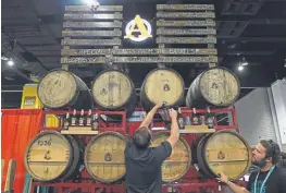  ?? Helen H. Richardson, Denver Post file ?? Avery Brewing Co. workers set up kegs at the 2015 Great American Beer Festival.