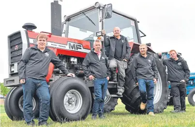  ??  ?? TRACTOR TREKKERS: From left, Barclay Gray, Graham Smith, Trevor Gray, Lee Murdoch and Gary Morrison