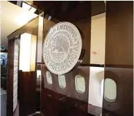  ??  ?? Mexico’s official government seal is seen on a wall of the Mexican Air Force Presidenti­al Boeing 787-8 Dreamliner during a media tour. — Reuters photo