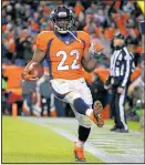  ?? JACK DEMPSEY/AP ?? Denver running back C.J. Anderson celebrates his touchdown run against Miami on Sunday.