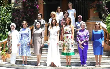  ??  ?? Handout picture released by the G20 Press Office showing the wives of the G20 leaders. — AFP photo