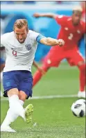  ?? / AP-Matthias Schrader ?? England’s Harry Kane kicks a penalty to score his team’s second goal during the group G match Sunday between England Panama.2 and