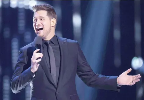  ?? THE CANADIAN PRESS ?? After taking a break from music, Michael Bublé says he’s thinking more about what he chooses to “put out into the universe.”